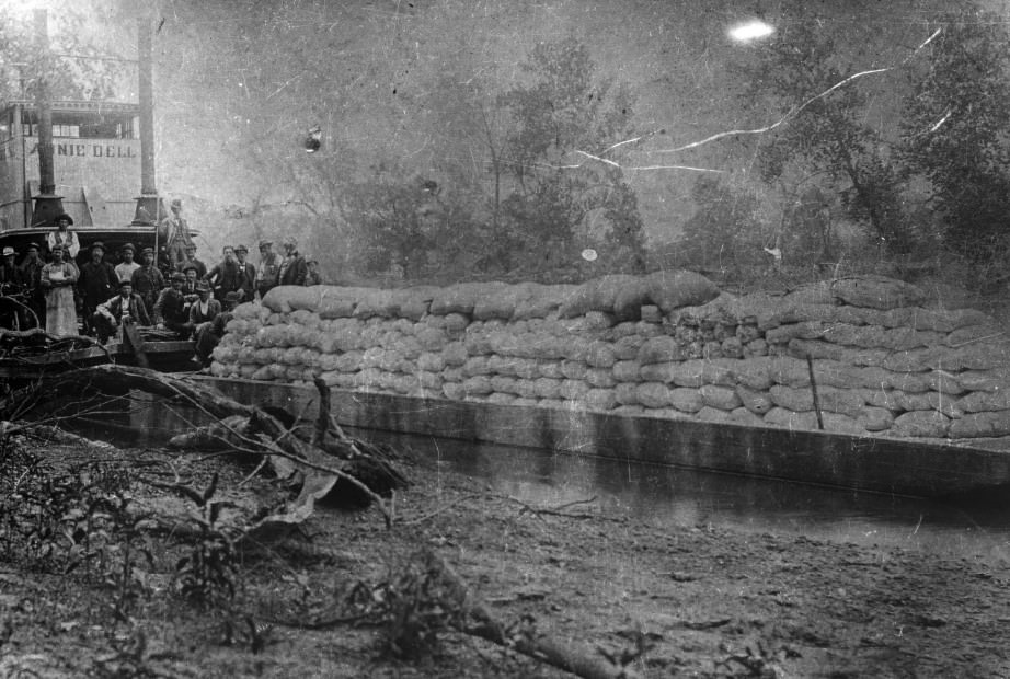 #8 Annie Dell with tow and cargo. Crew posing on the bow. Gasconade River, carrying wheat, 1890.