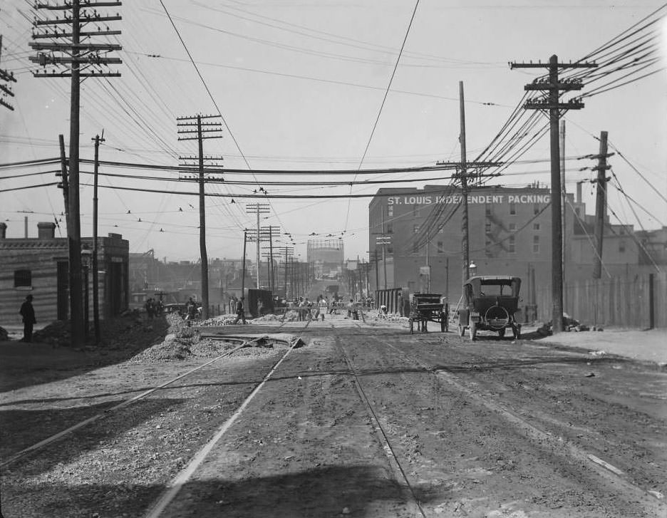#105 Looking west down Chouteau Ave. at South Spring Ave. The St. Louis Independent Packing Co. at right center was located at 3857 Chouteau Ave, 1925