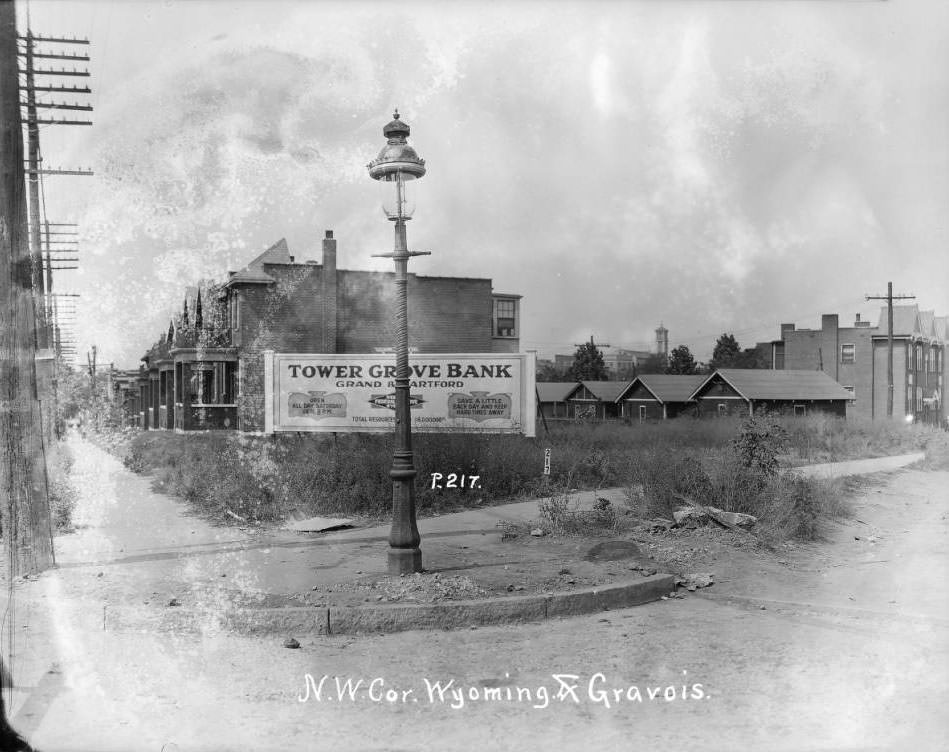 #25 View of the southwest corner of Gravois and Wyoming in the Tower Grove East neighborhood. St. Pius V Catholic Church is visible in the distance, 1925