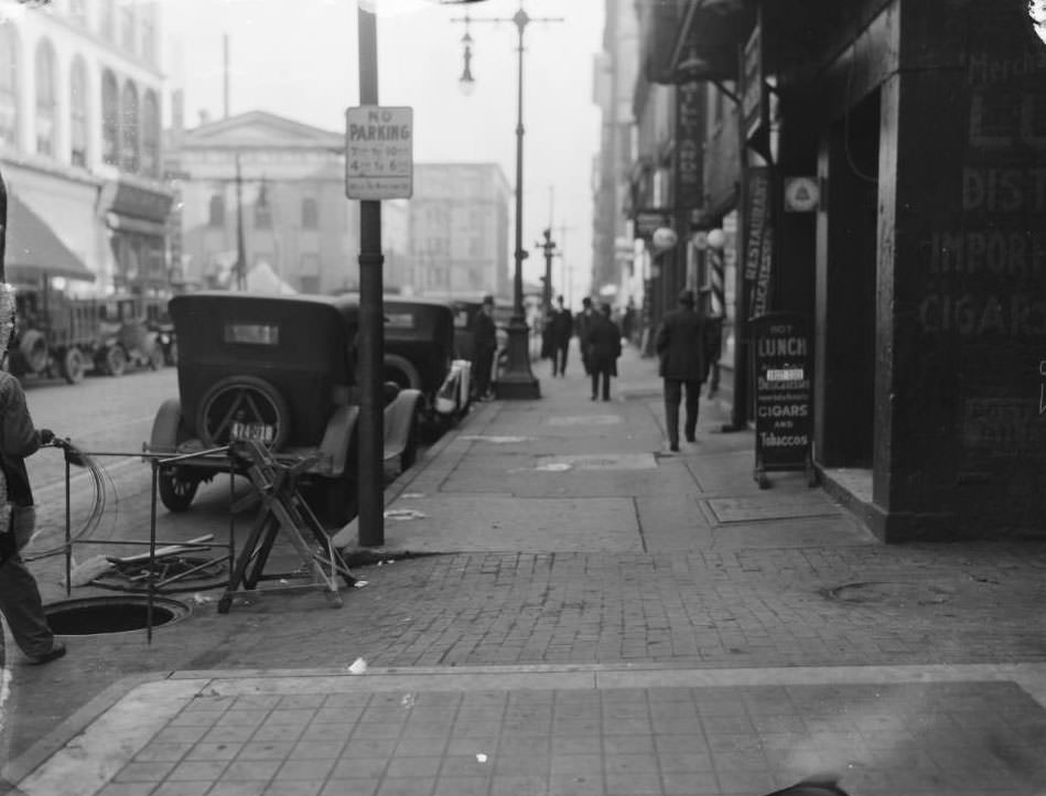 #76 Looking east down the south sidewalk of Market Street, towards the intersection with Broadway (Fifth Street), 1925