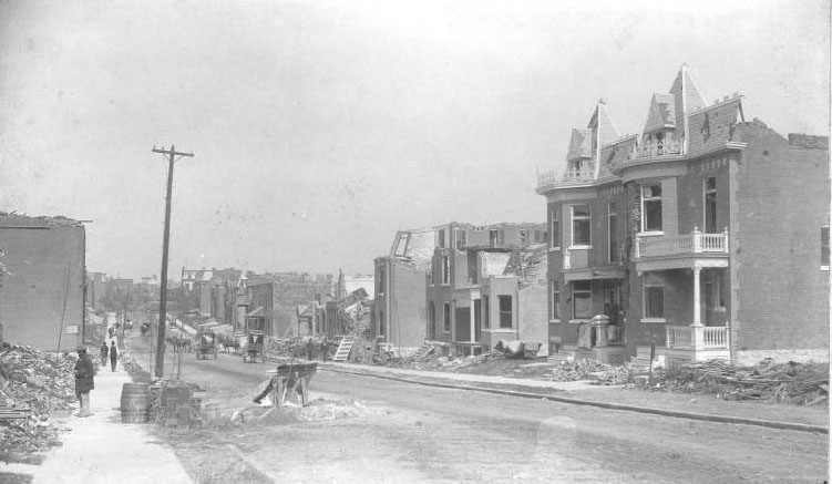 #5 This view of Allen Avenue, looking west from Jefferson Avenue, clearly shows the severe damage inflicted on the homes and other buildings along this street, just southwest of Lafayette Park.