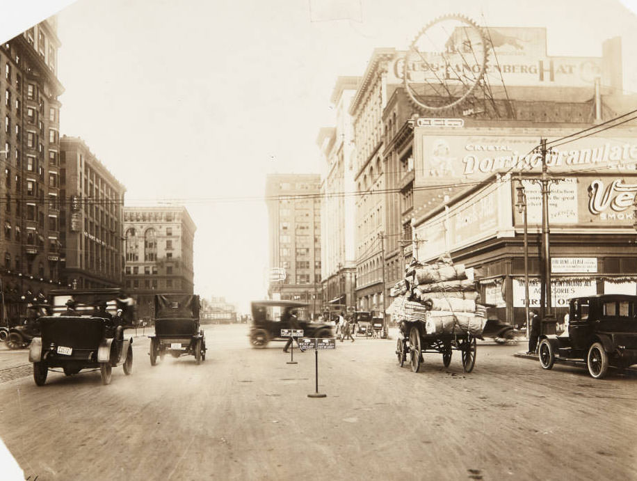 #27 A busy street scene at the intersection of 12th and Locust, looking north, 1910