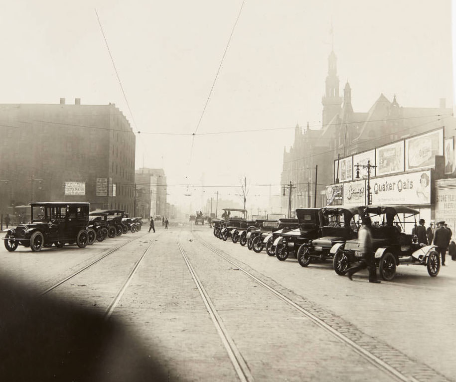 #46 A row of automobiles parked along 12th Street, looking south, 1913