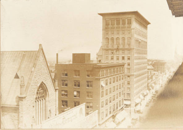#51 Buildings along the western side of North Grand, looking northwest, 1915
