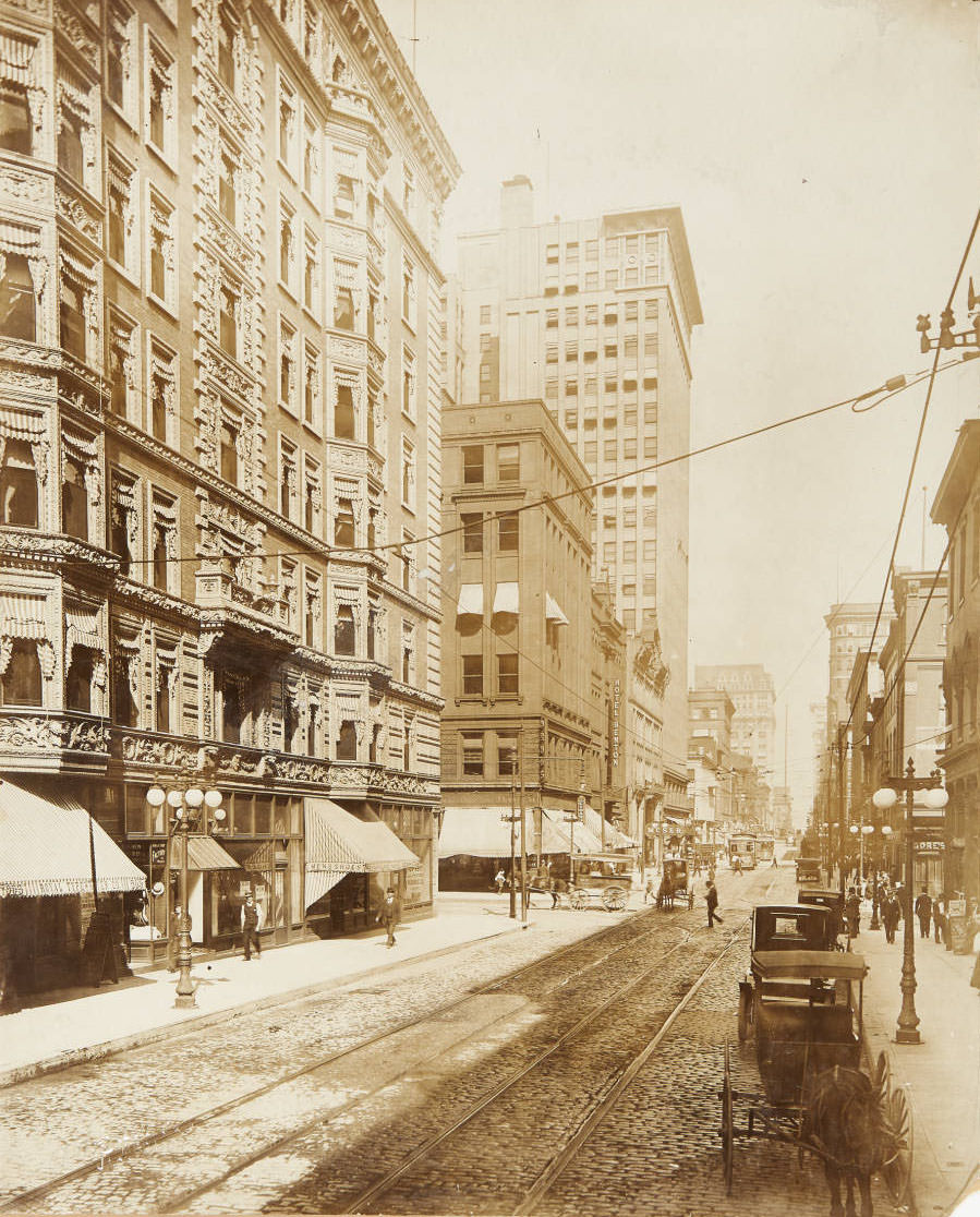 #78 A busy downtown traffic scene near the intersection of 9th and Pine streets, looking east on Pine, 1915