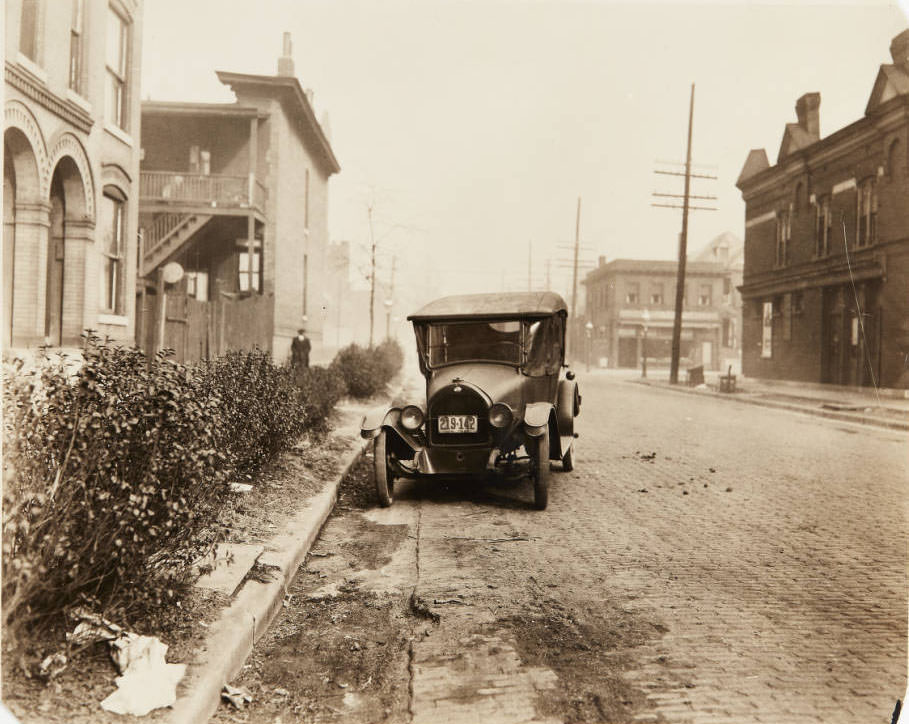 #81 A car parked on the street on Pendleton Avenue near its intersection with Page Blvd, 1915