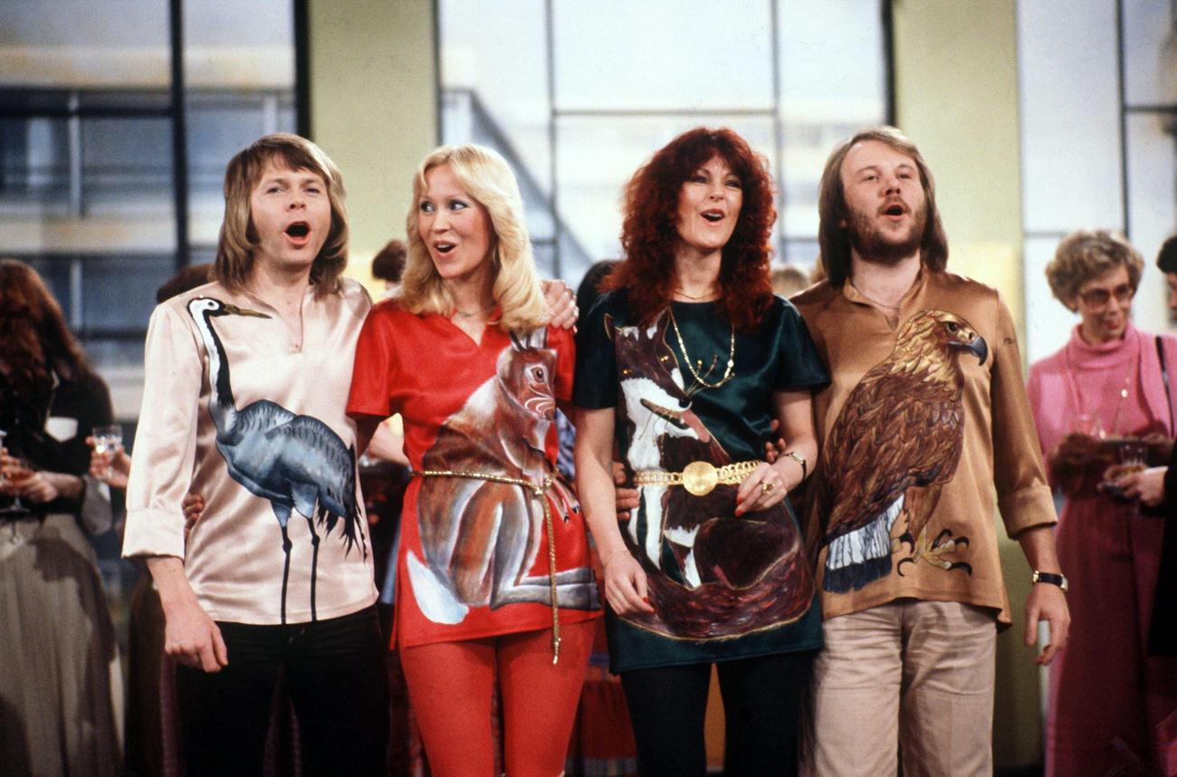#15 Björn Ulvaeus, Agnetha Fältskog, Anni-Frid Lyngstad and Benny Andersson during a performance on the German TV show “Amlaufen Band” in February 1978.