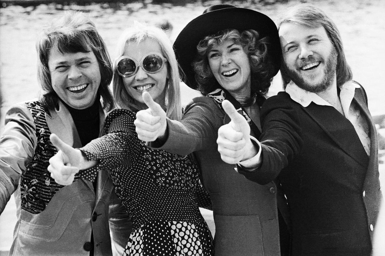 #41 ABBA give the thumbs up after winning the Eurovision Song Contest with their song ‘Waterloo’, Brighton, 7th April 1974.