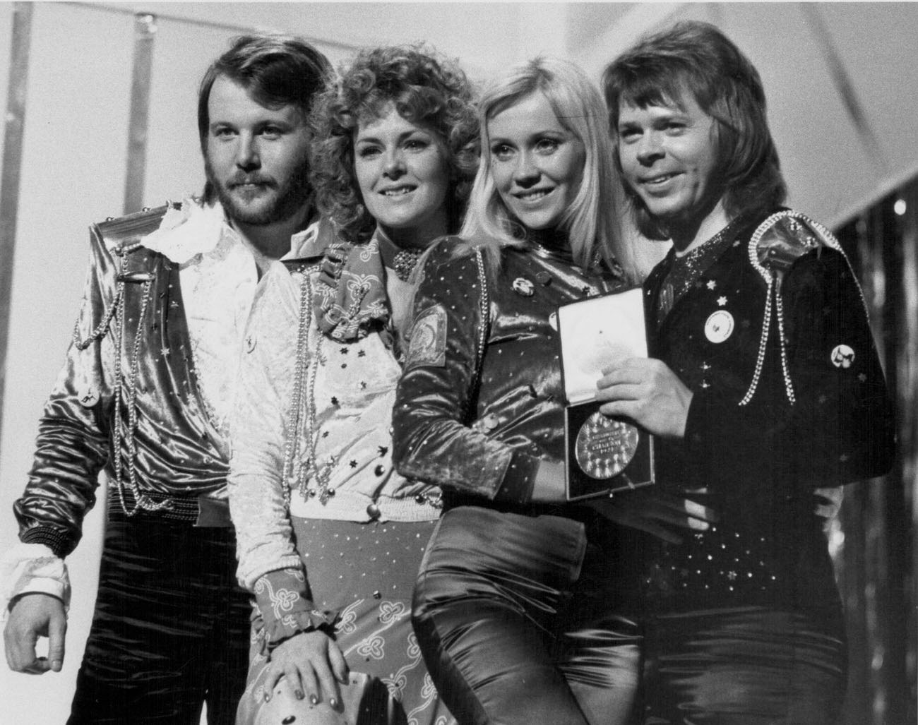 #44 Swedish pop group Abba on stage, after winning the Eurovision Song Contest, Brighton, England, April 7th 1974.