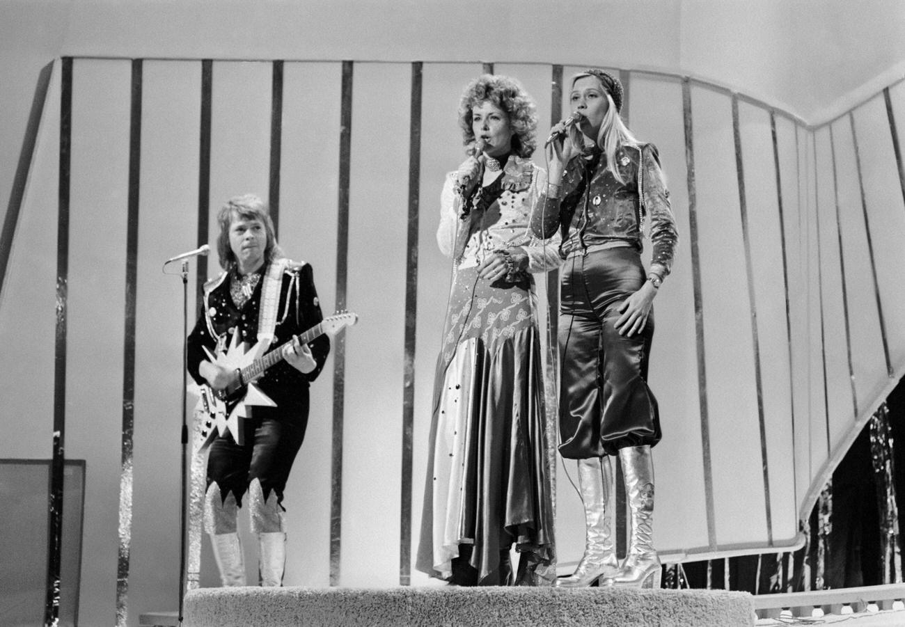 #50 Bjorn Ulvaeus, Anni-Frid Lyngstad and Agnetha Faltskog of ABBA playing live on stage, 1974