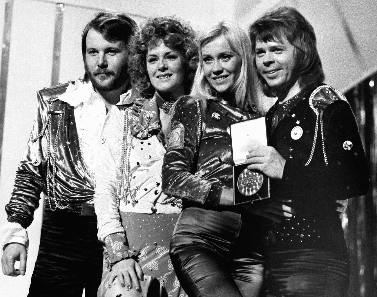 #64 Abba with the first prize they won with their song Waterloo at the Eurovision Song Contest in Brighton.
