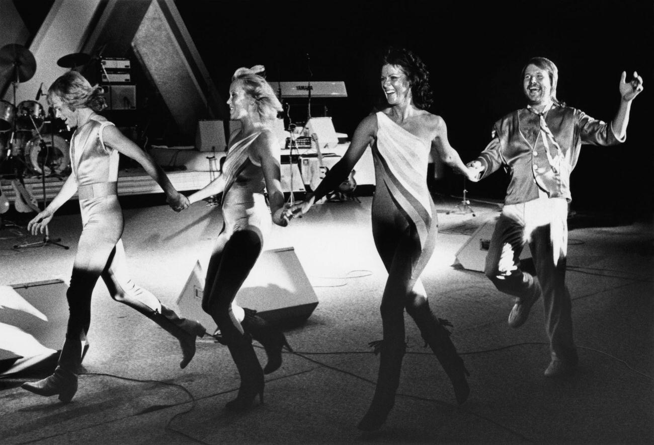 #7 Bjorn Ulvaeus, Agnetha Faltskog, Anni-Frid Lyngstad and Benny Andersson of the pop group ABBA dance across the Concord Pavilion stage during a rare 1981 concert in Walnut Creek, California.