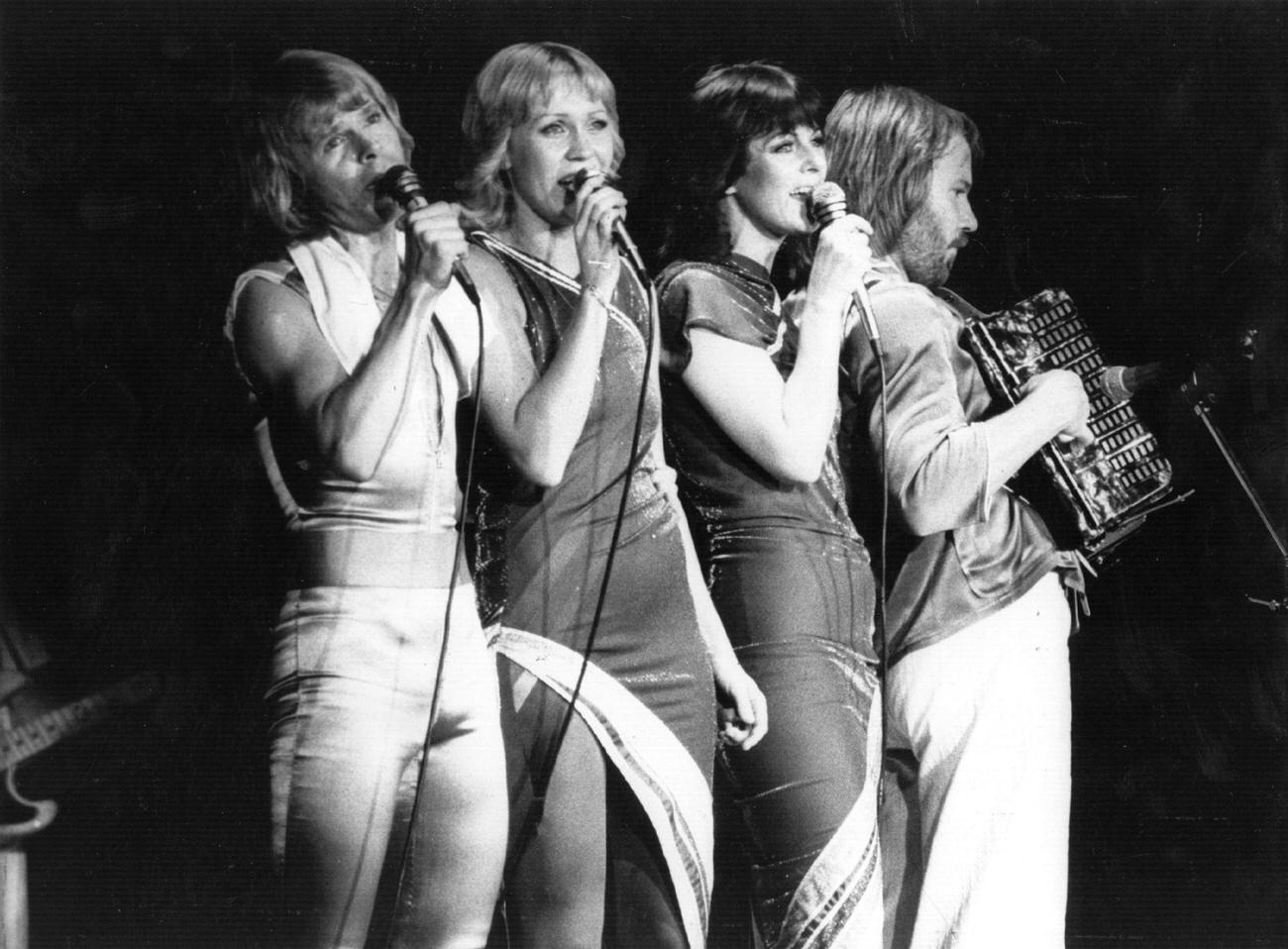 #8 Abba (left to right) Bjorn Ulvaeus, Agnetha Faltskog, Anni-Frid Lyngstad and Benny Andersson, in concert, 1979