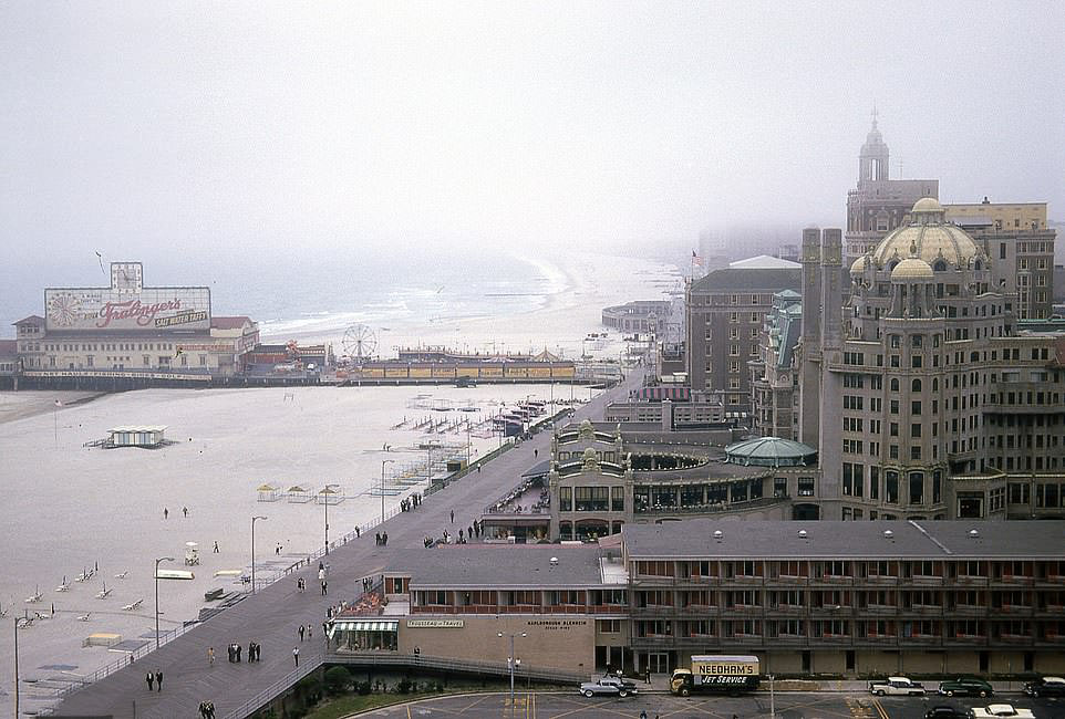 #48 A shot showing an overview of the Atlantic City Boardwalk and the Steel Pier. On the pier, a huge ad can be seen for Fralinger’s salt water taffy – a sweet treat