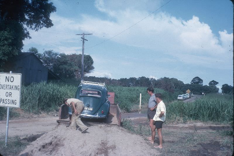 #11 Betty driving Gi-Gi off truck after crossing the Herbert, Feb 1963