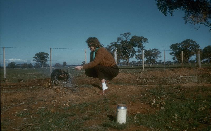 #37 Betty at campfire, 1963