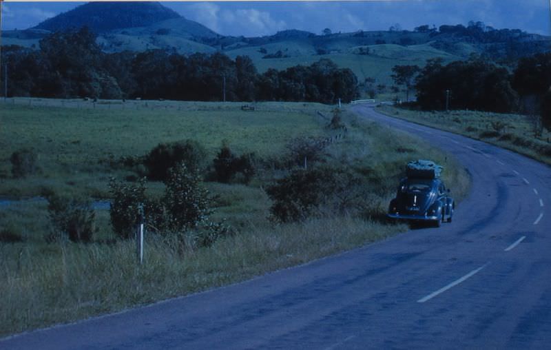 #51 VW at highway, 1963