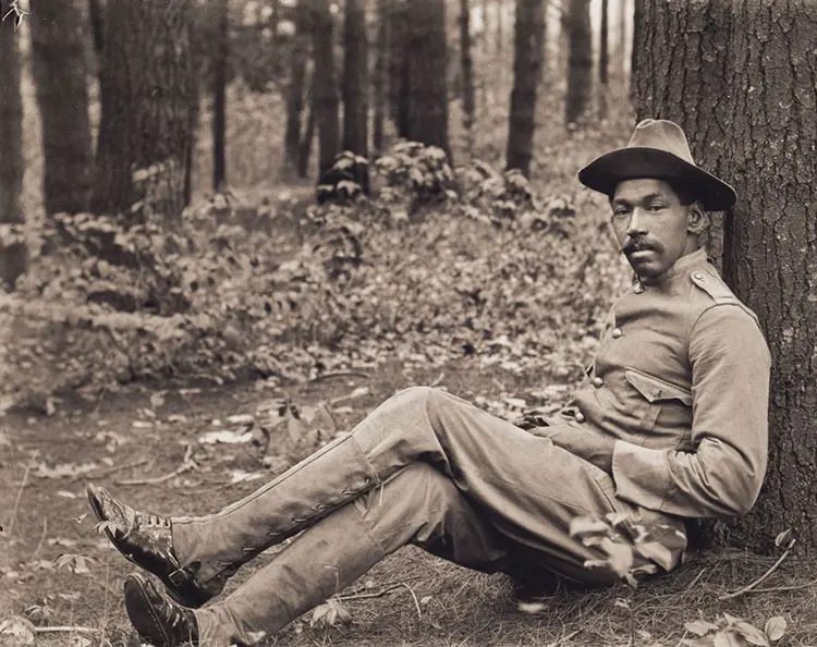 #34 Reuben Griffin Seated against a Tree, 1901.