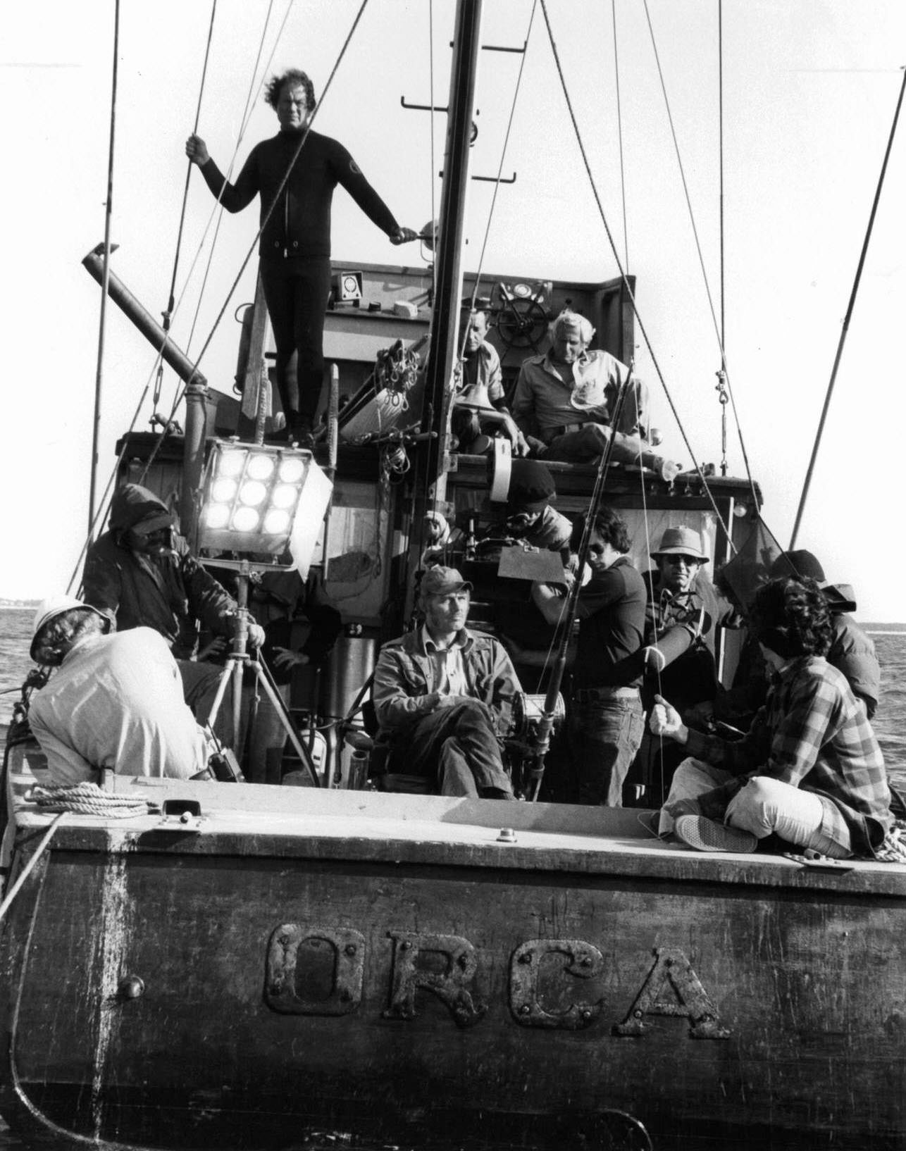 Roy Scheider on top deck as crew set up to film a scene from the film ‘Jaws’, 1975.