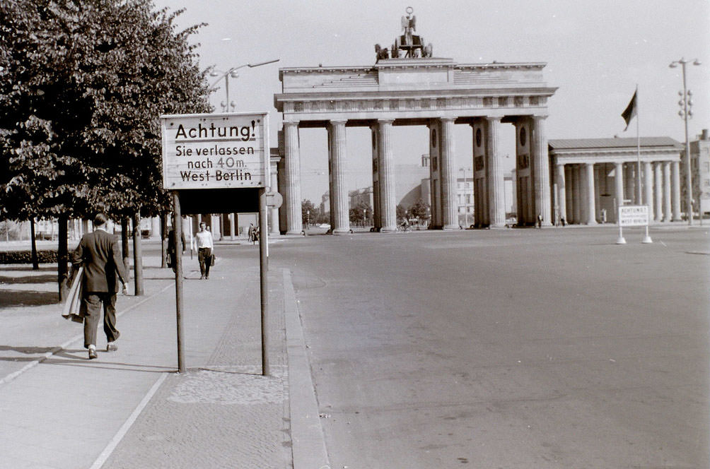 #41 This view is looking into East Berlin from the western sector. The border lies 40 metres past the notice. Despite what was commonly thought, the whole of the Brandenburger Tor was in East Berlin.