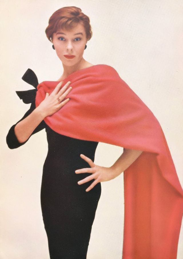 #109 Bettina is wearing a geranium-pink jersey velours self-lined stole by Susan Small, 1953