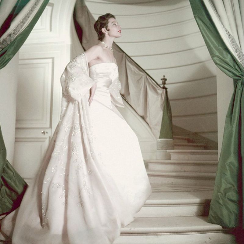 #111 Bettina wearing a pink strapless gown and embellished organdy coat from Dior, Paris, May 1953