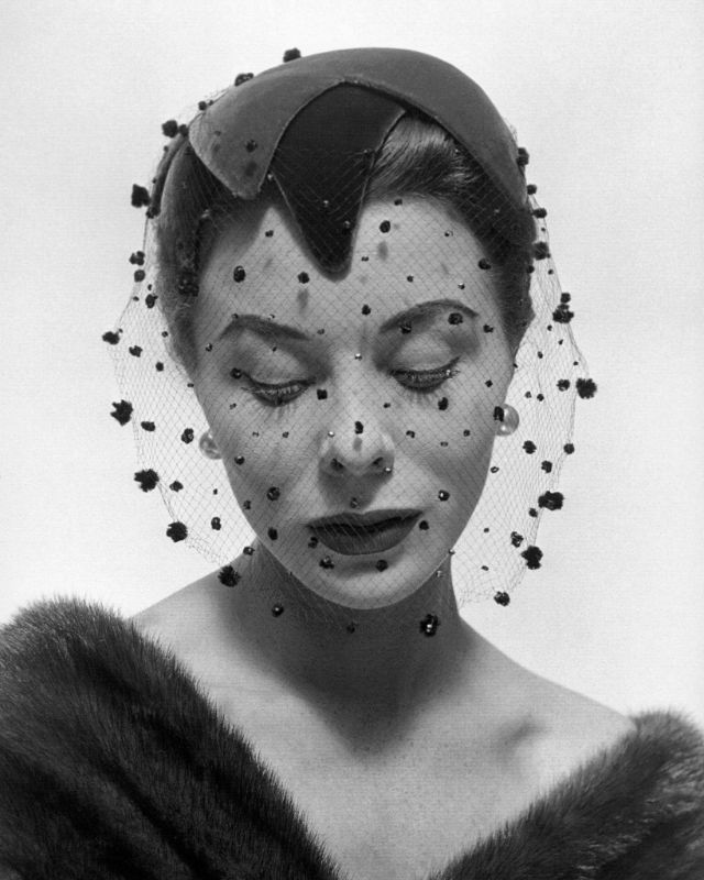 #112 Bettina wearing velvet veiled hat by Paulette, Arachnée, November 1953