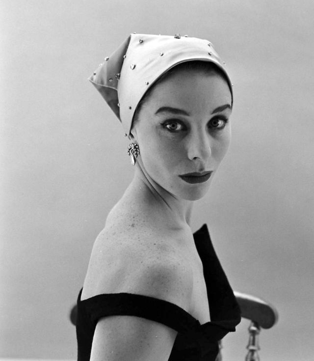 #97 Bettina is wearing headscarf covered with paillettes by Givenchy, February 1952