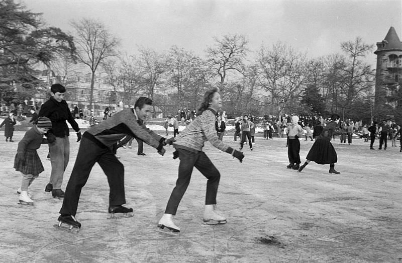 #10 A young couple skating on the playground.
