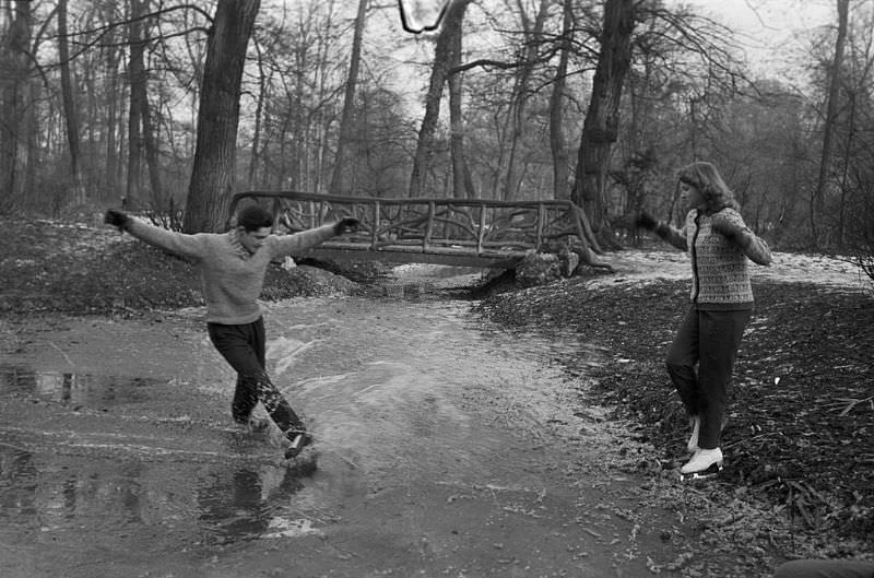 #15 A man showing his friend how to skate.