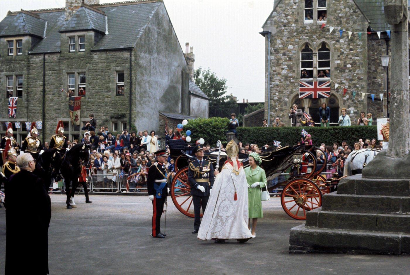 #4 Queen Elizabeth II being greeted by the Bishop of Llandaff, the Rt Rev John Worthington Poole-Hughes, as she arrives with the Duke of Edinburgh at Llandaff Cathedral, Cardiff