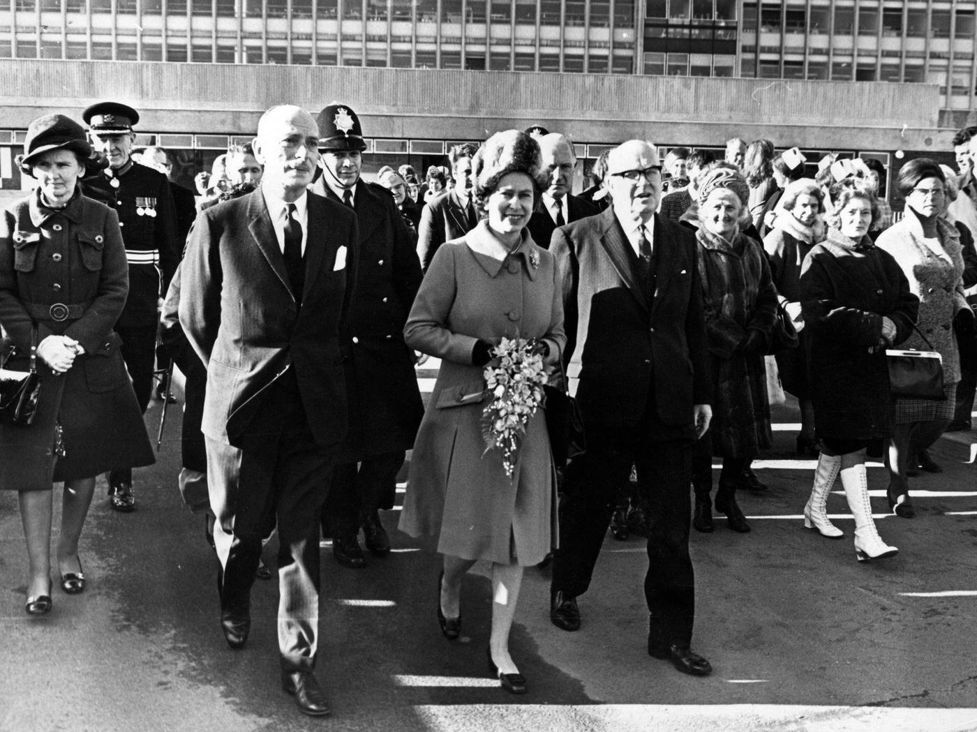 #19 Queen Elizabeth II walks to Cardigan House from the hospital.