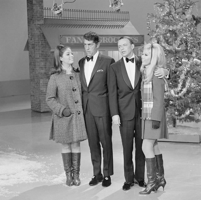 #41 Dean Martin and Frank Sinatra joined by daughters Gail Martin and Nancy Sinatra for a Christmas segment on The Dean Martin Show, 1967.