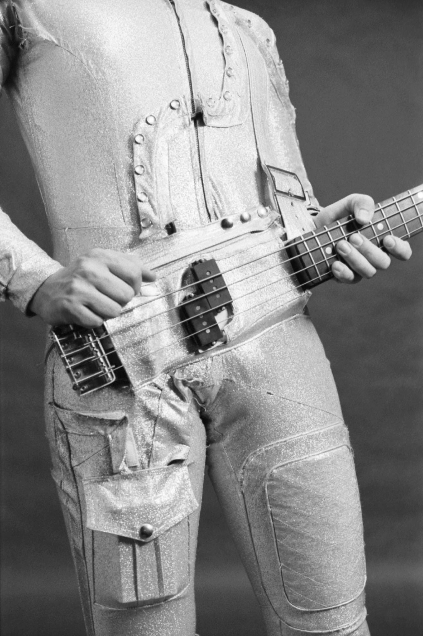 #10 Dan Hartman wearing the Sound and holding a guitar