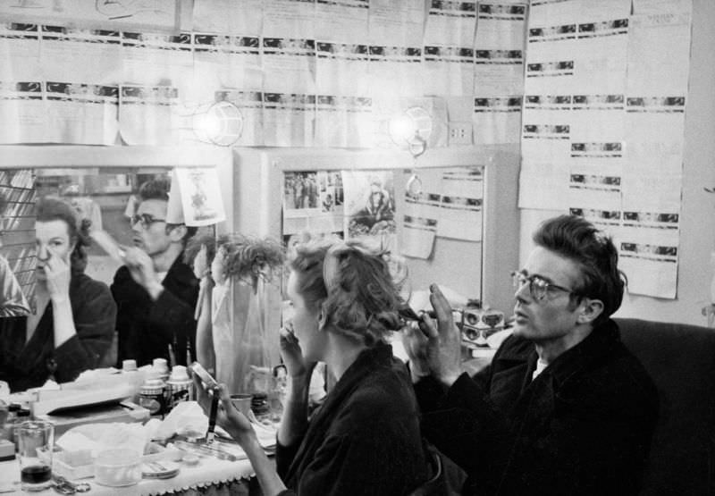 #21 James Dean with actress Geraldine Page in her dressing room, 1955