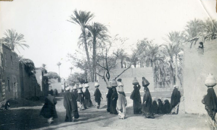#51 Egyptian women carrying water