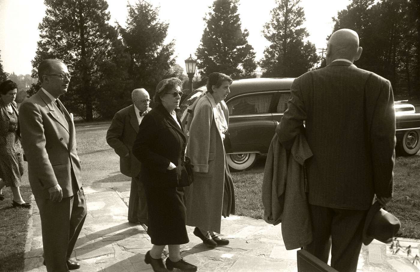 #5 Mourners pay their respects to Albert Einstein as they enter the service while his casket rests nearby in Princeton in April 1955.