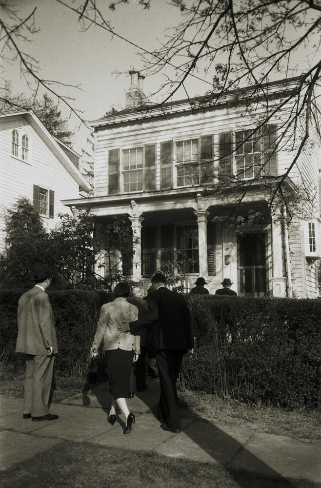 #8 Family and friends return to Albert Einstein’s home at 112 Mercer Street in Princeton, New Jersey, after his funeral in April 1955.
