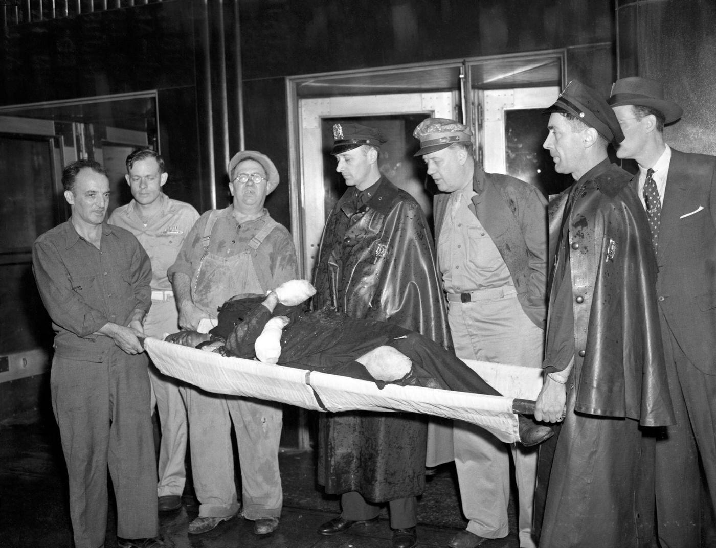 #8 Firemen Carrying a Casualty From Crash