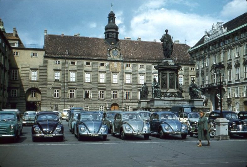 #21 Hofburg palace with statue of Francis II and VW beetles, Vienna, Austria, 1958