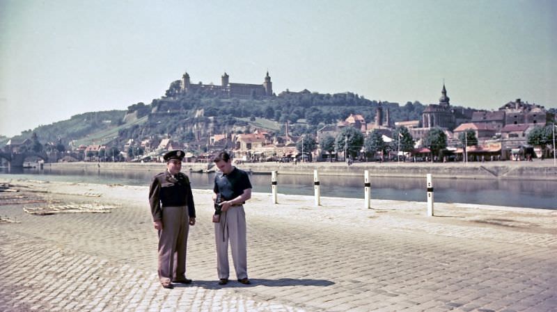 #125 Leo and Max on the bank of the Main in Würzburg with the Marienberg in the background, Germany, 1950