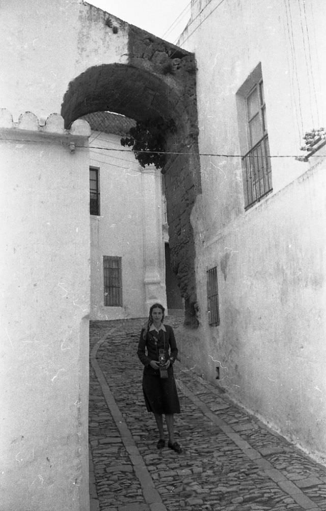 #144 Spain. Elise in alley, 1950