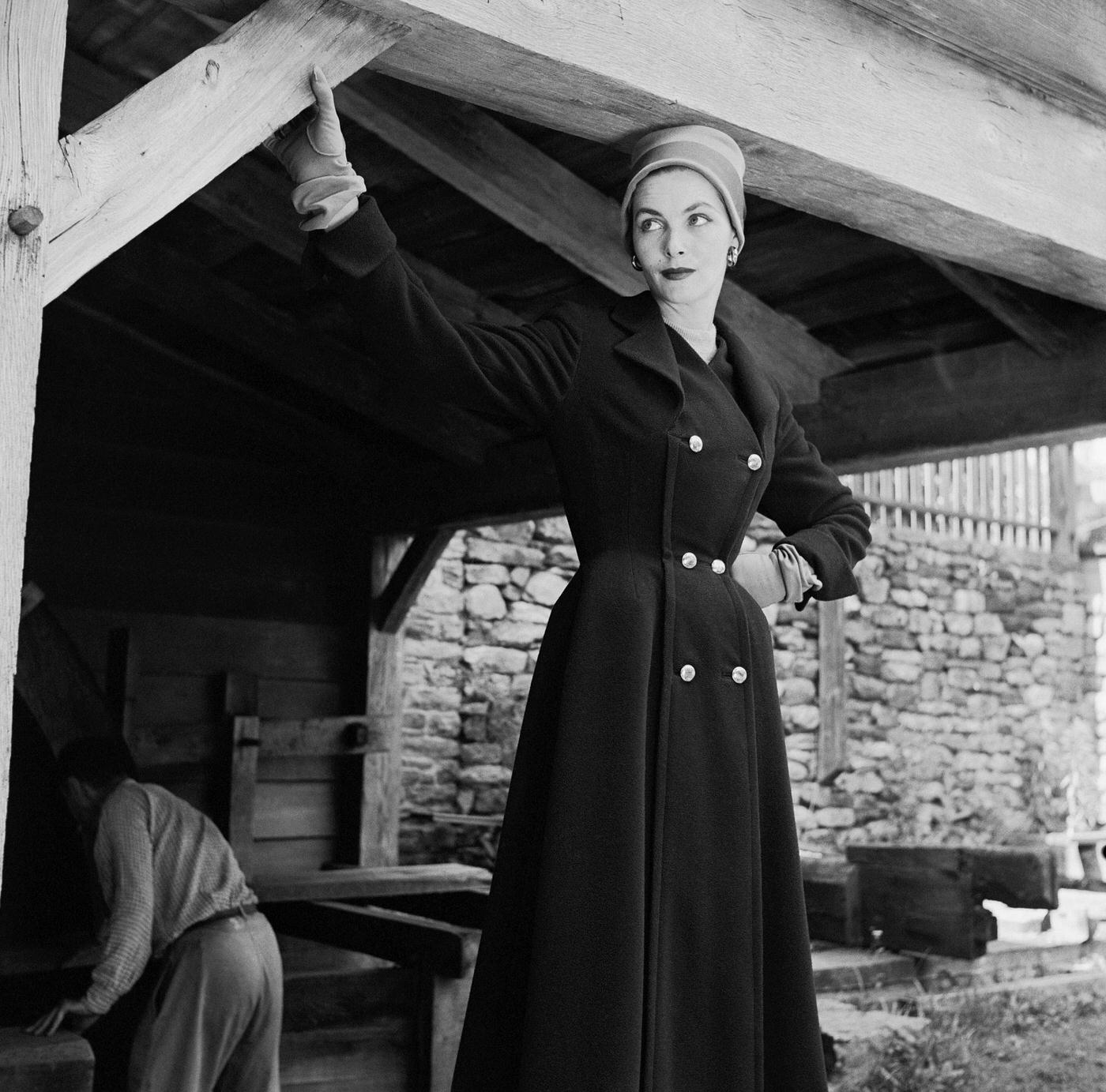 #35 Georgia Hamilton models a wool coat suit by Seymore Fox in the barn at Philipes Manor Hall.