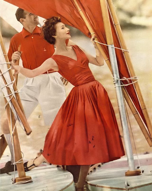 #12 Ruth Neumann Derujinsky in red Wamsutta cotton dress by Jerry Gilden, photo by Gleb Derujinsky, Harper’s Bazaar, January 1957