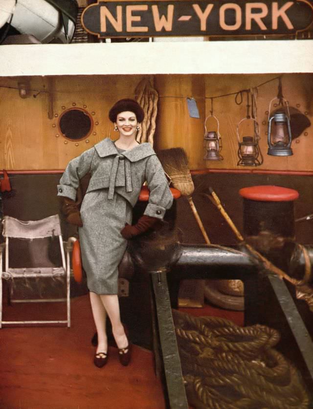 #14 Carmen Dell’Orefice in pebbly gray Forstmann wool dress and jacket, jacket has big kimono collar and deep cuffs by Christian Dior-New York, photo by Gleb Derujinsky, Harper’s Bazaar, September 1958