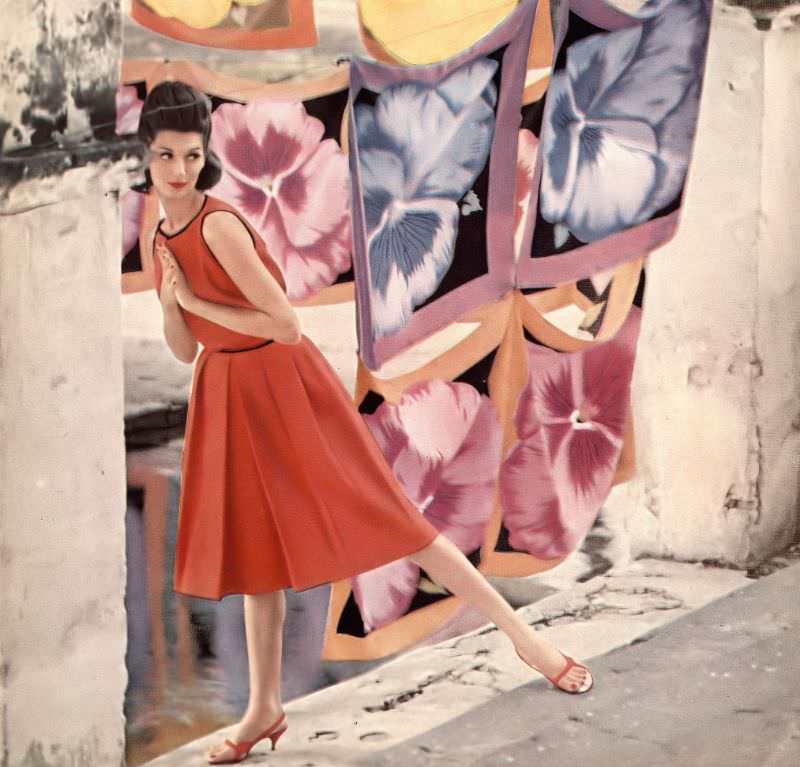 #30 Simone d’Aillencourt in red linen top trimmed in black braid and skirt with inverted pleats by Sloat, red sandals by Mademoiselle, photo by Gleb Derujinsky, Harper’s Bazaar, June 1959