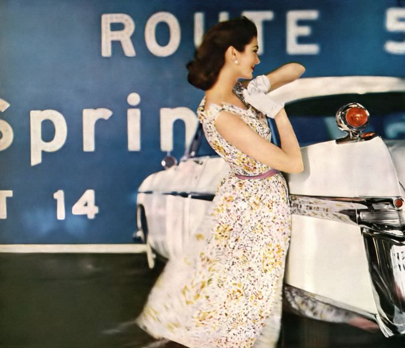 #4 Carmen Dell’Orefice in summery shift of a dress dappled with wild flowers and sashed with a ribbon by David Crystal, photo by Gleb Derujinsky, the car is Chrysler’s Imperial “Southampton”, Harper’s Bazaar U.S., May 1956