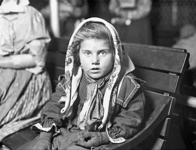 #22 Italian child dinds her first penny, 1926.