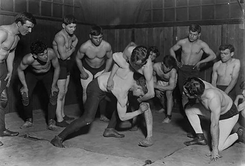 #28 Greek wrestling club at Hull House, Chicago, 1910.