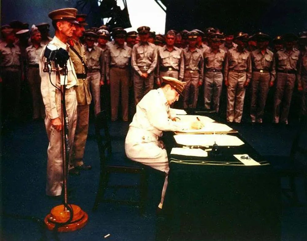 #12 Gen. MacArthur signs Japanese Surrender Instrument.